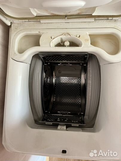 Стиральная машинка с вертикальной загрузкой