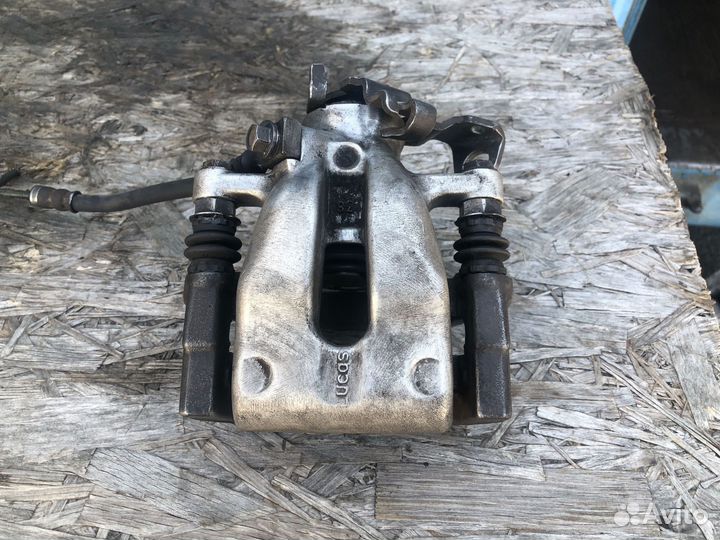 Суппорт задний левый для Opel Astra H