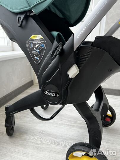 Коляска автокресло doona с базой isofix