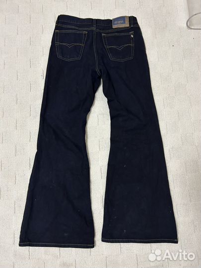 Джинсы клеш