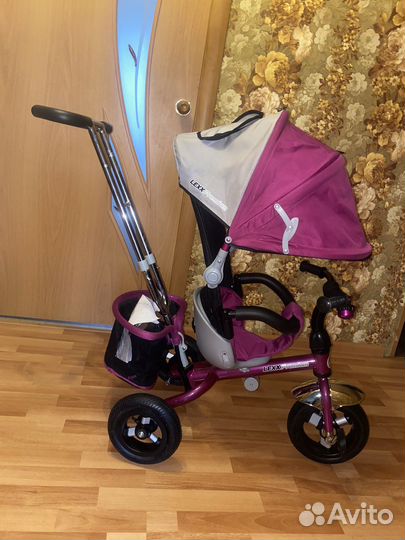 Детский велосипед с родительской ручкой