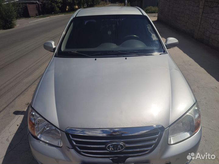 Капот kia cerato 1