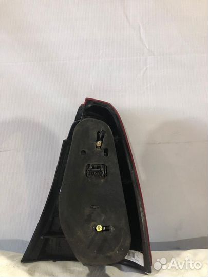 Фонарь заднего хода задний левый Renault Logan 1