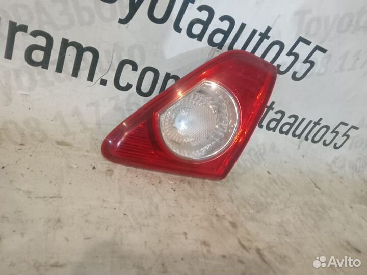 Фонарь в крышку багажника Тойота Королла Е150