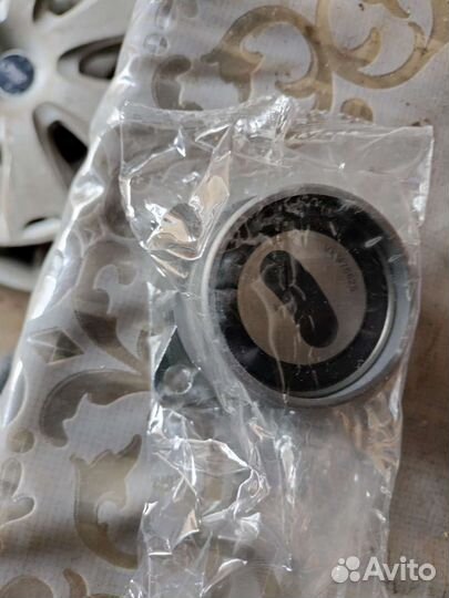 Натяжной ролик ремня грм lancer 9