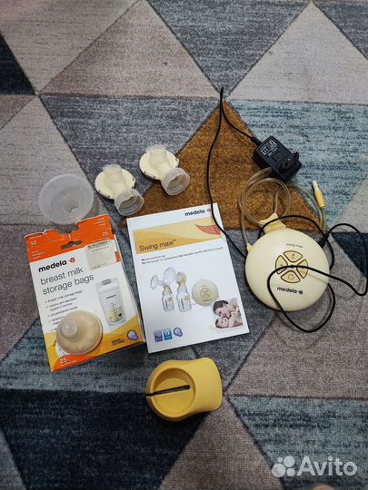 Молокоотсос medela swing электрический