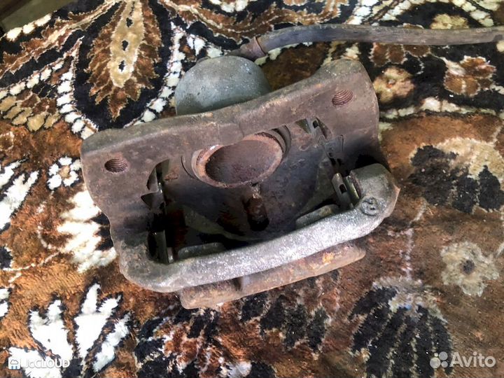 Суппорт на toyota funcargo NCP25 1NZ