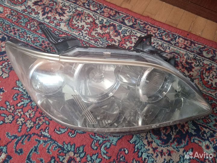 Фара Mazda mpv2