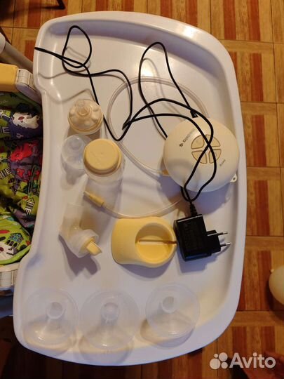 Электрический молокоотсос Medela