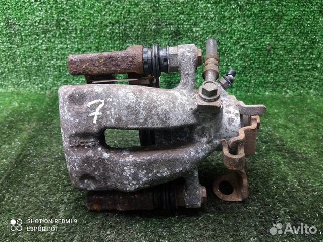 Суппорт задний левый Opel Astra H (2004-2014)