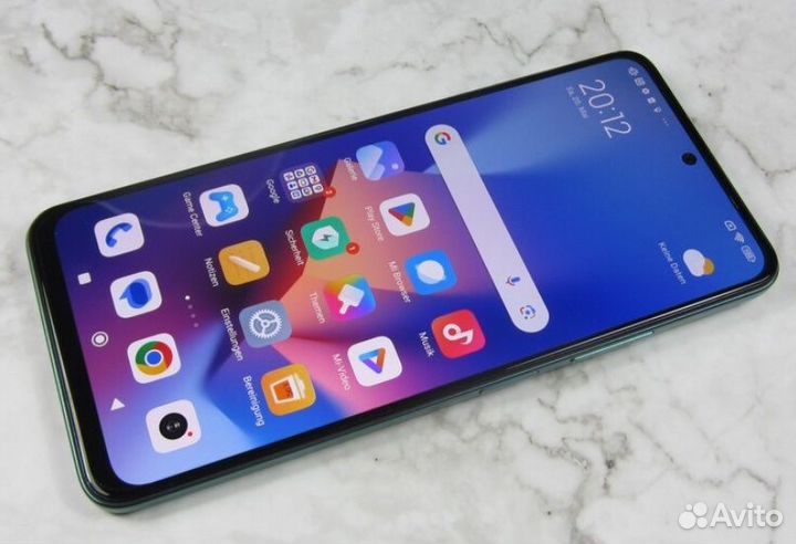 Подам смартфон Xiaomi Redmi 12