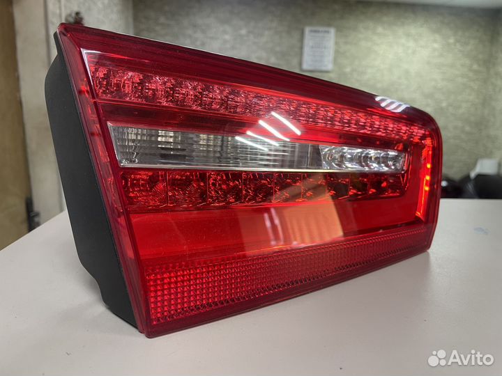 Фонарь левый в крышку багажника Ауди А6 С7