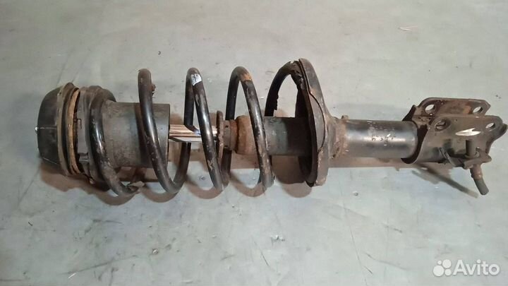 Стойка амортизатора передняя левая Chevrolet