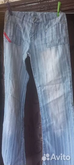 Джинсы клеш