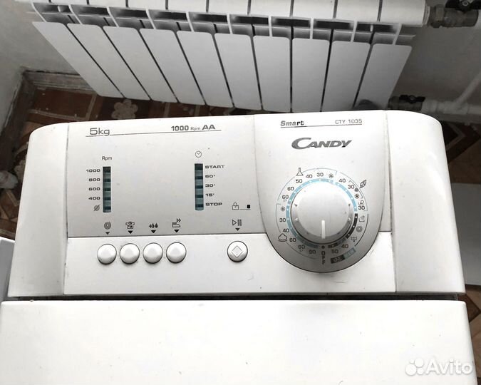 C вертикальной загрузкой Candy CTY 1035 Italy