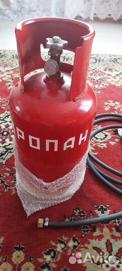Газовый балон и шланг