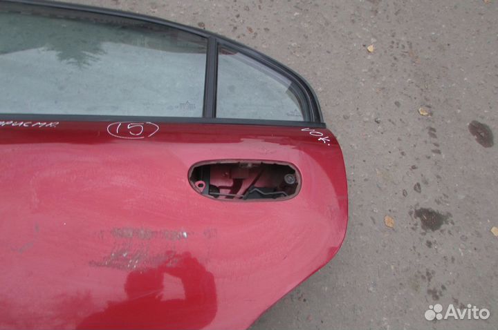 Дверь Mitsubishi Carisma в сборе