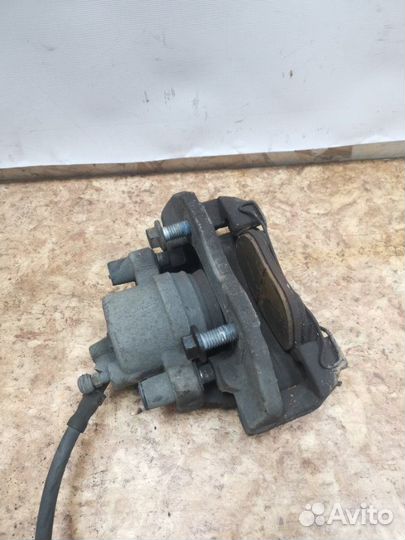 Суппорт тормозной передний левый Ford Focus 2