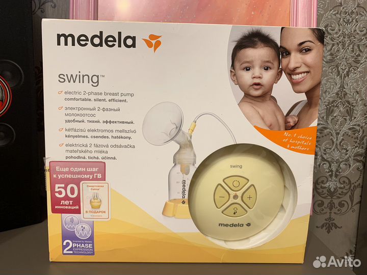 Молокоотсос medela swing