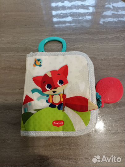 Продам книжку Tiny Love, салфетку марионетку и др