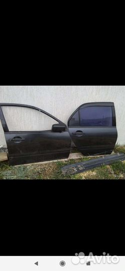 Двери Mitsubishi lancer 9