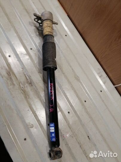 Стойка подвески задняя правая Opel Corsa D Z12XEP