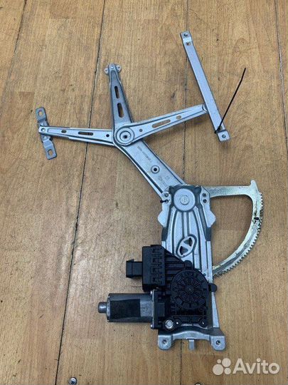 Стеклоподъемник передний левый Opel Zafira B