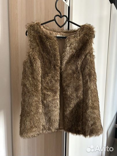 Меховая жилетка