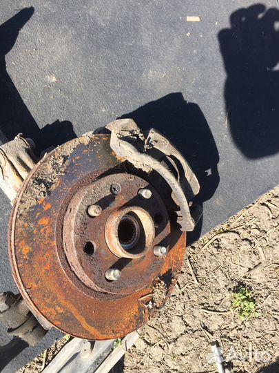 Шевроле Авео Кулак поворотны левый в сборе