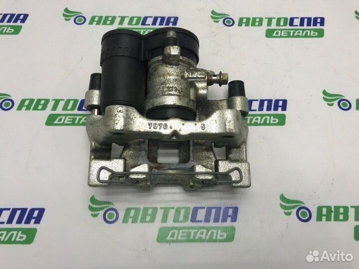 Суппорт тормозной задний правый Mazda 3 BP PE / P5