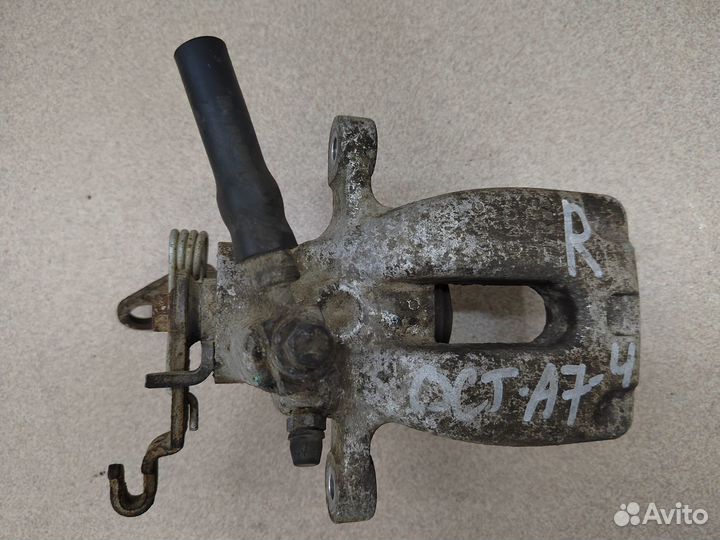 Суппорт задний правый Skoda Octavia A7