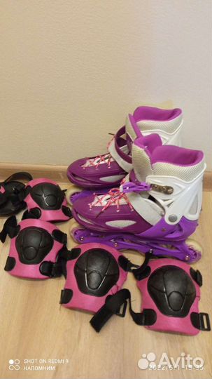 Роликовые коньки