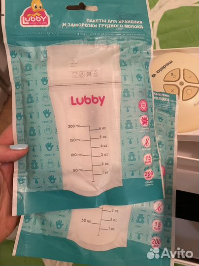 Молокоотсос medela электрический