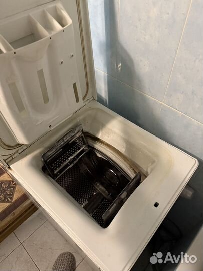 Стиральная машина с вертикальной загрузкой