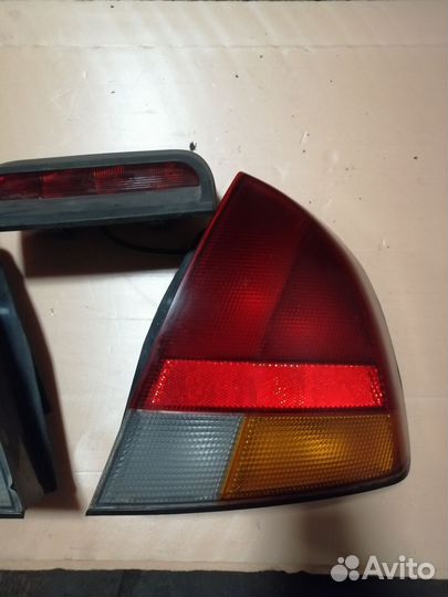 Фонарь задний левый Митсубиси каризма