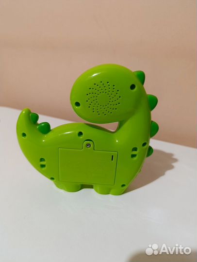 Музыкальный динозаврик