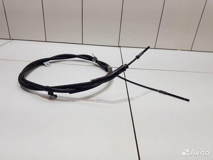 Трос стояночного тормоза педали