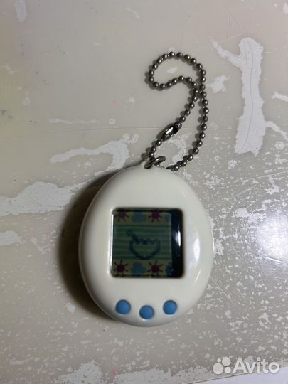 Тамагочи динозаврик