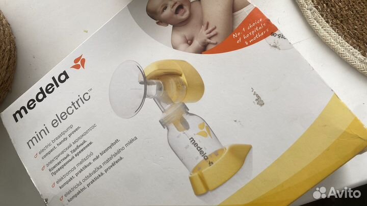 Молокоотсос medela электрический