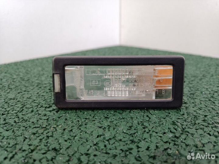 Фонарь подсветки номера Renault Fluence K4M838