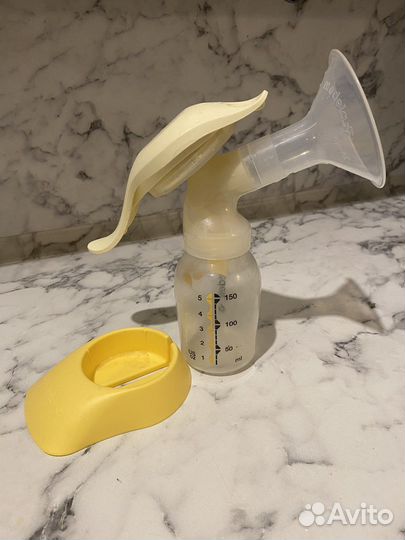 Молокоотсос medela ручной