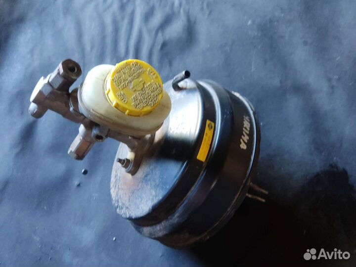 Вакуумник в сборе с гтц Nissan Maxima a32