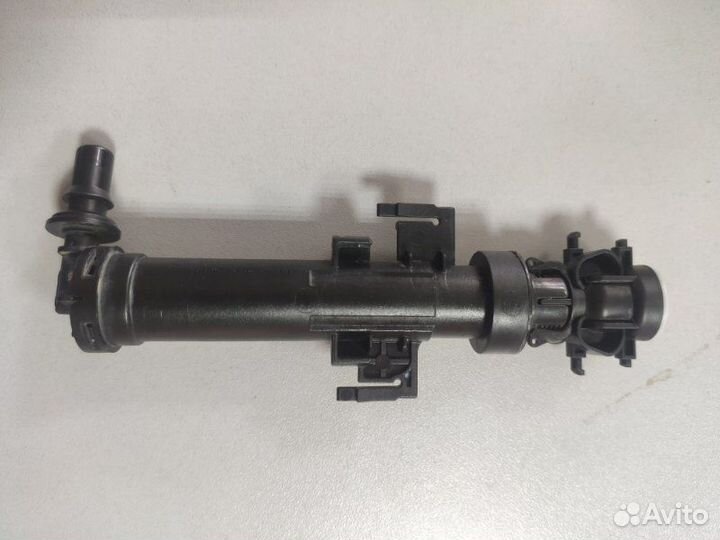 Форсунка омывателя фар передняя левая Skoda