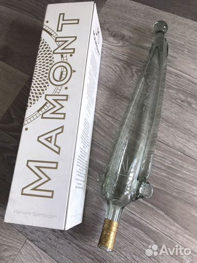 Бутылка фигурная сабля и мамонт цена за обе