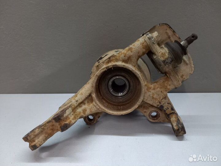 Кулак (цапфа) передний левый Kia Cerato 2011