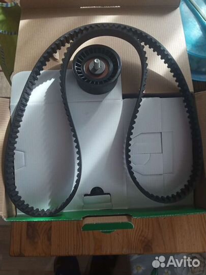 Ремень грм + ролик на Опель