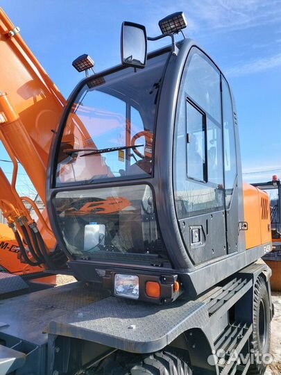 Колёсный экскаватор UMG E145W, 2023