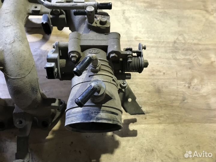 Дроссельная заслонка Kia Rio 1