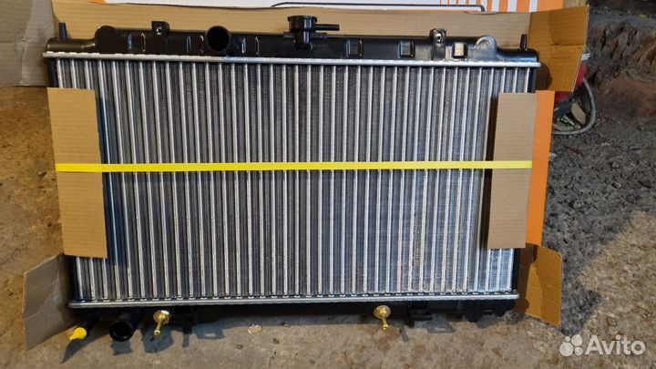 Радиатор primera P12 01-08 RHD QR20 / 25 / SR20