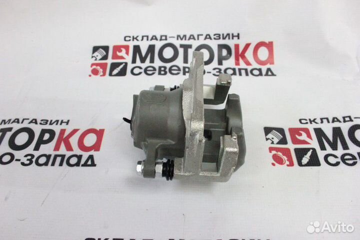 Суппорт тормозной задний левый Toyota Rav4 2azfe